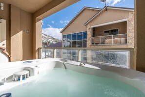 Unwind and relax in the patio hot tub, perfect for a soothing soak | The Hillside, Brian Head, Utah | Voyax Luxury Vacation Rentals