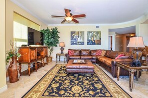 Well appointed living room with ocean view.