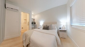 Relax in this bright and comfortable bedroom, perfect for both short and extended stays. With A/C and heating, you’ll enjoy the perfect temperature year-round for a restful retreat