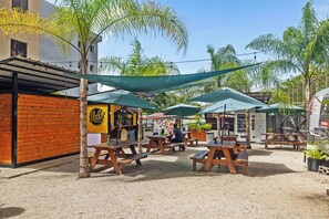 Lote 23 is a trendy and fun place to eat a variety of food options and it is just a 6-8 minute Uber away!