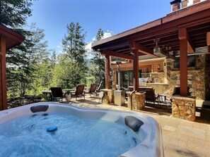 Private Spa Tub - Soak in your own private hot tub with stunning mountain vistas and an outdoor entertainment area for family and friends.