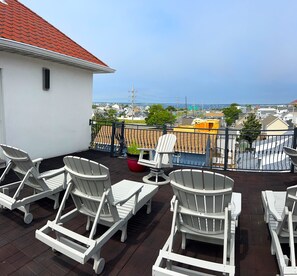 Stunning roof deck views of ocean sunsets and summer fireworks displays!