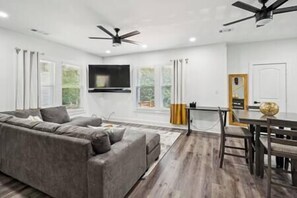 Living room area with dedicated workspace