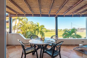 Golf view terrace with 4 guest dining, lounge chairs & BBQ