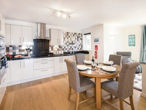 Kitchen/dining room with ceramic hob, electric oven | Spindrift, Seahouses