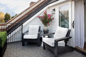 Enjoy the beautiful Charlotte weather from the fourth floor terrace.