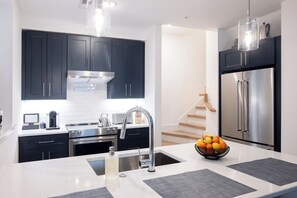 Gather fresh ingredients from one of the charming food markets in Uptown and cook up a storm! Our kitchen is equipped with everything needed to make a delicious meal for you and your guests