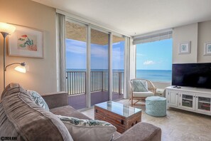 Beautiful Accommodations include comfortable furniture, a HUGE TV and a GORGEOUS VIEW!