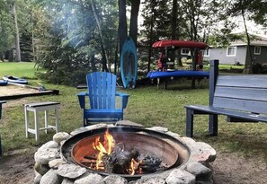 Exterior - seating kayaks and fire pit