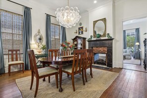 Beautiful dining room with table for 6 and a gas powered fireplace