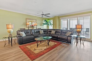 Living room sectional has recliners on both ends