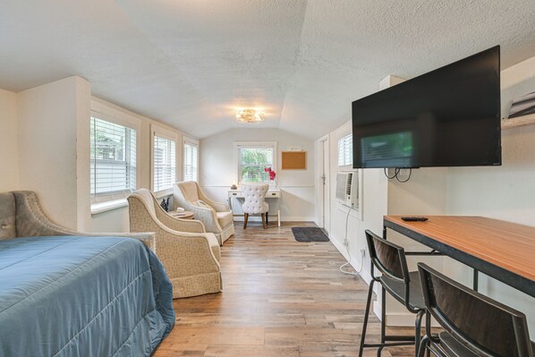 Living Area | Single-Story Studio | Wall A/C & Heating Unit | Desk Workspace