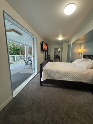 BEDROOM #2 OPENS ONTO PRIVATE DECK WITH LAKE VIEW AND 30 FT WIDE WATERFALL 