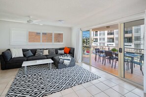 Cosy up on the comfortable couch and watch a movie with family or friends.