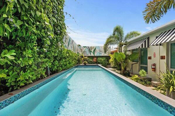 Experience a boutique hotel with a personality. Our exterior boasts a refreshing pool, open-air gym, and quirky signage that reflects our playful spirit.