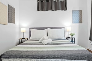 Bedroom: Enjoy modern comforts in the eco-friendly ambiance of our home