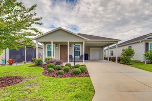 Exterior | Covered Porch | Golf Cart Garage