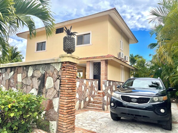 Entrance & parking space