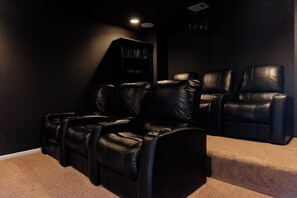 Theatre seating in the media room upstairs