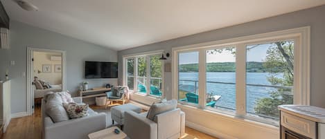 Living Area with Expansive Views of Prospect Bay + 55' Smart TV