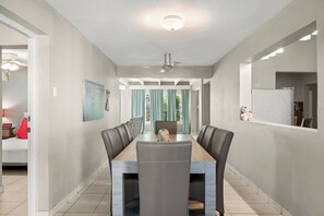 Elegant dining setup in a stylish hallway.