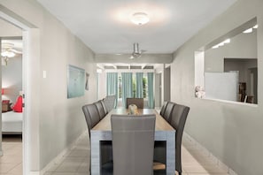 Elegant dining setup in a stylish hallway.