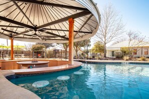 Picture yourself sipping on your favorite cold drink at the unique silo swim-up bar.