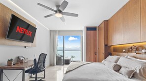 King size bed with desk and smart TV