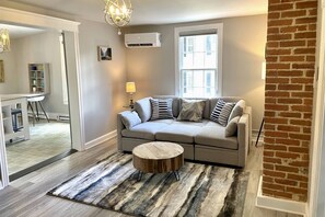 The family room is perfect for a small family traveling to visit the local area.