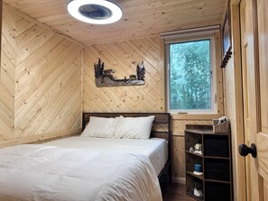 Cozy Queen Mattress and two Nightstands with Charging Stations
