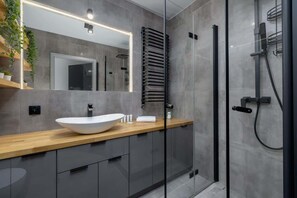 Bathroom with washing machine.