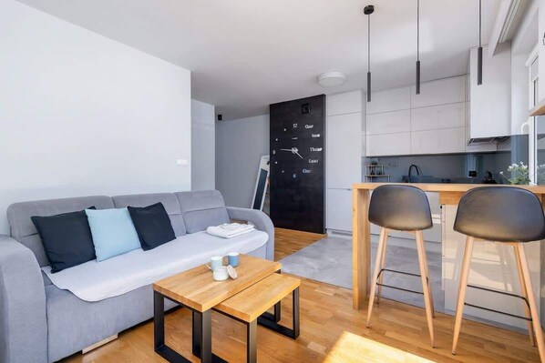 Living room with kitchenette.