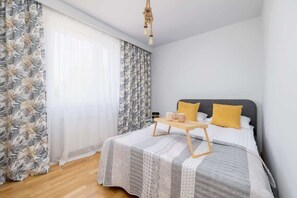 Bedroom with comfortable double bed.