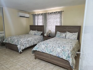 2 Fullsize beds, TV and A/C 