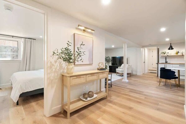 Welcome to the basement suite of the home. The stylish decor combines clean lines with cozy elements, creating a sophisticated and inviting ambiance.