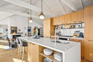 View of Kitchen with Thermador appliances and custom cabinetry