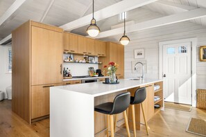 View of Kitchen with Thermador appliances and custom cabinetry
