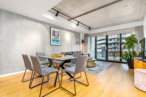 The stylish 6-seater dining table combines elegance with functionality, offering ample space for dining and entertaining. Its sleek design and contemporary finish make it a standout piece in any dining area.