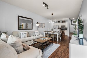 Comfortable living room integrated with kitchen.