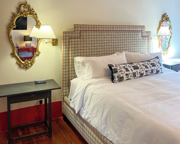 The Ares Suite- features a king size bed with premium mattress and adjoining small bedroom with 2 twin beds