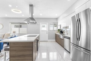 Kitchen Stainless steel appliances give the kitchen a sleek, contemporary look.