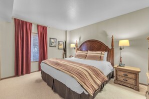 Bedroom 1: King bed, closet, dresser