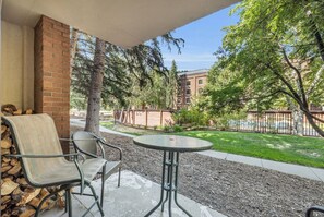 Exterior: Private back patio, bistro table and 2 chairs, pool views
