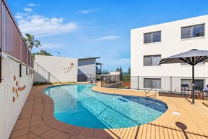Take a dip in the sparkling shared pool.