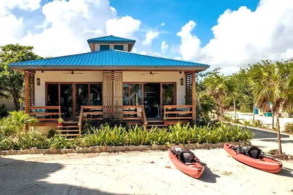 Beachfront Bliss! Wake up to the gentle sounds of waves and the fresh sea breeze in this beachfront private estate. With direct access to the sandy shores, every moment becomes an opportunity to savor the joys of coastal living.