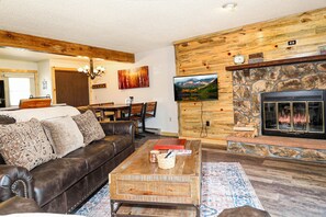 Living area w/ woodburning fireplace