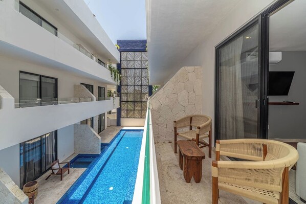 Relax and enjoy stunning views from the private balcony
