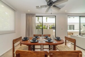 Gather around the elegant dining table for memorable meals and conversations