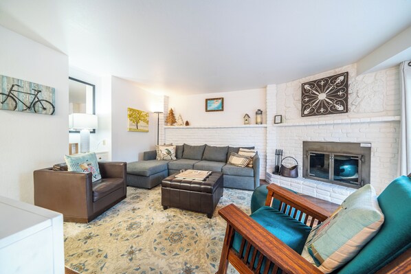 Cozy Living Room with Fireplace and Ample Seating