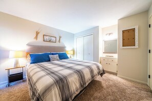 Comfortable Bedroom with King Bed and Ensuite Vanity